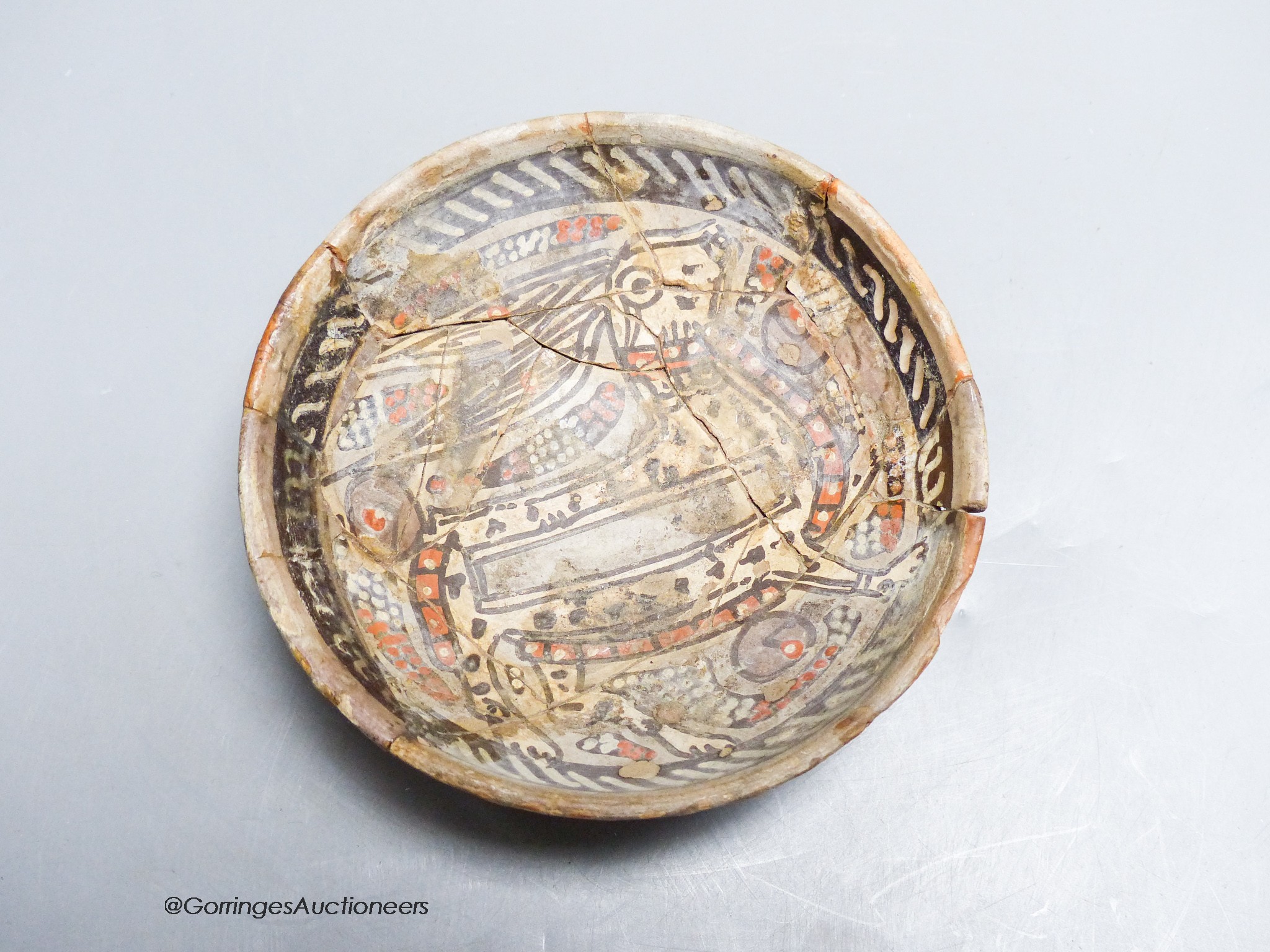 A small Persian bowl, circa 10th century, diameter 12cm (a.f.)
